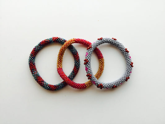 Nepal Beaded Bracelets Set of 3 Gold Red Gray Flower